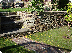 Garden path and stone wall